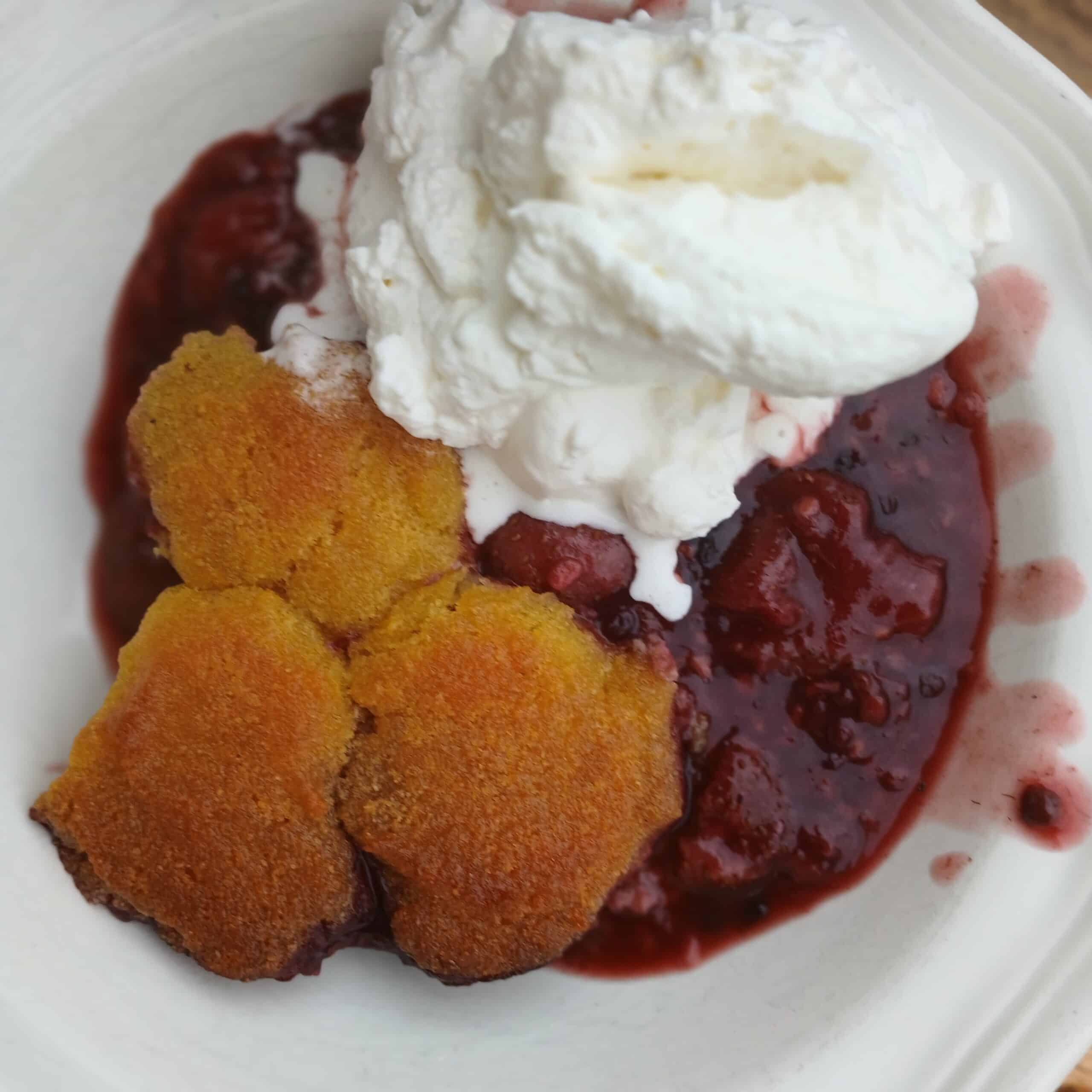 berry cobbler with whipped cream
